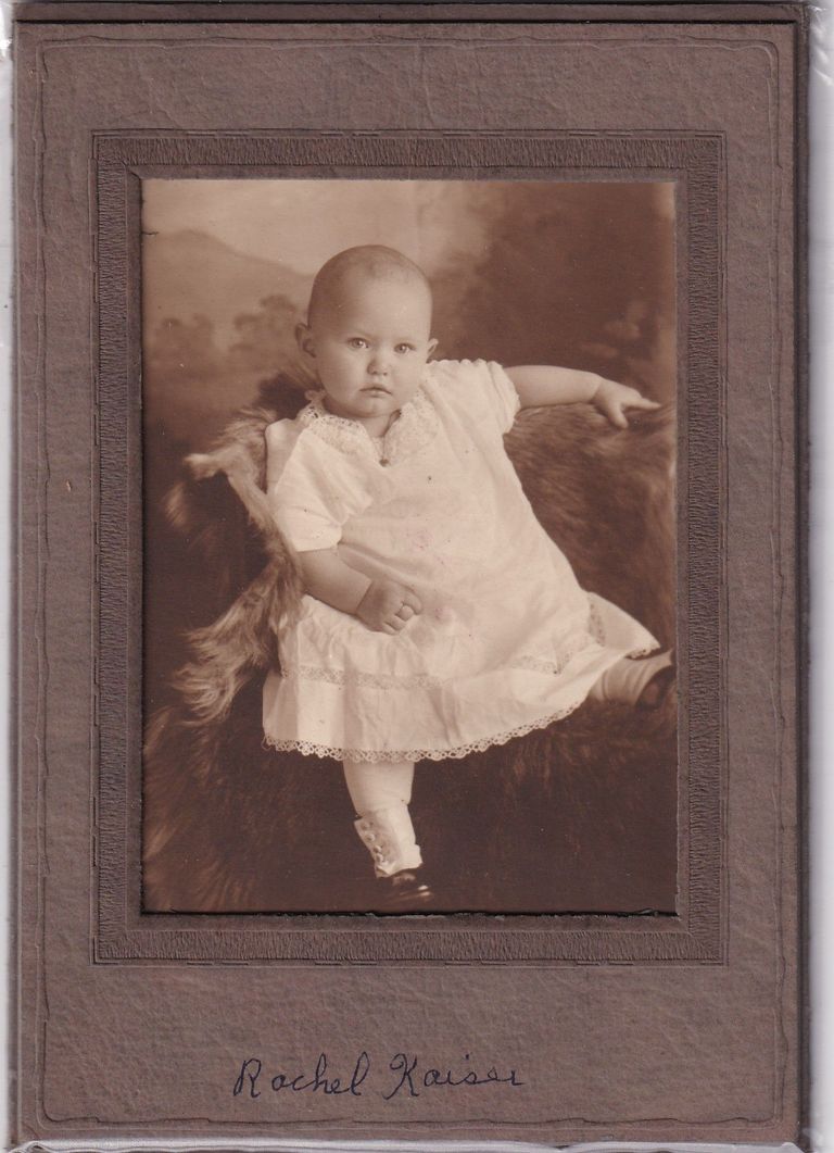 Portrait of Infant “Rachel Kaiser” Reclining on Fur Studio Prop