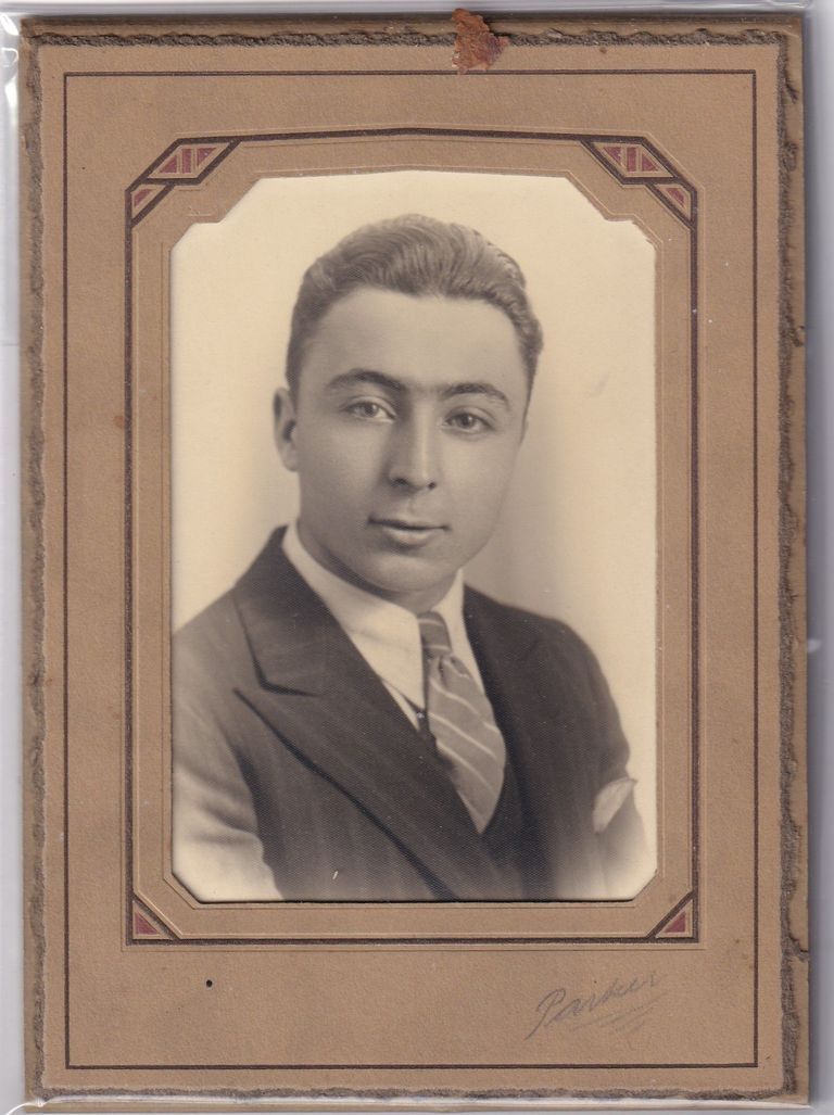 Young Man in Suit and Tie — Formal Studio Portrait