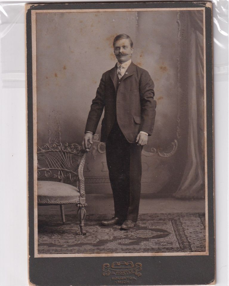 Gentleman with Waxed Handlebar Mustache