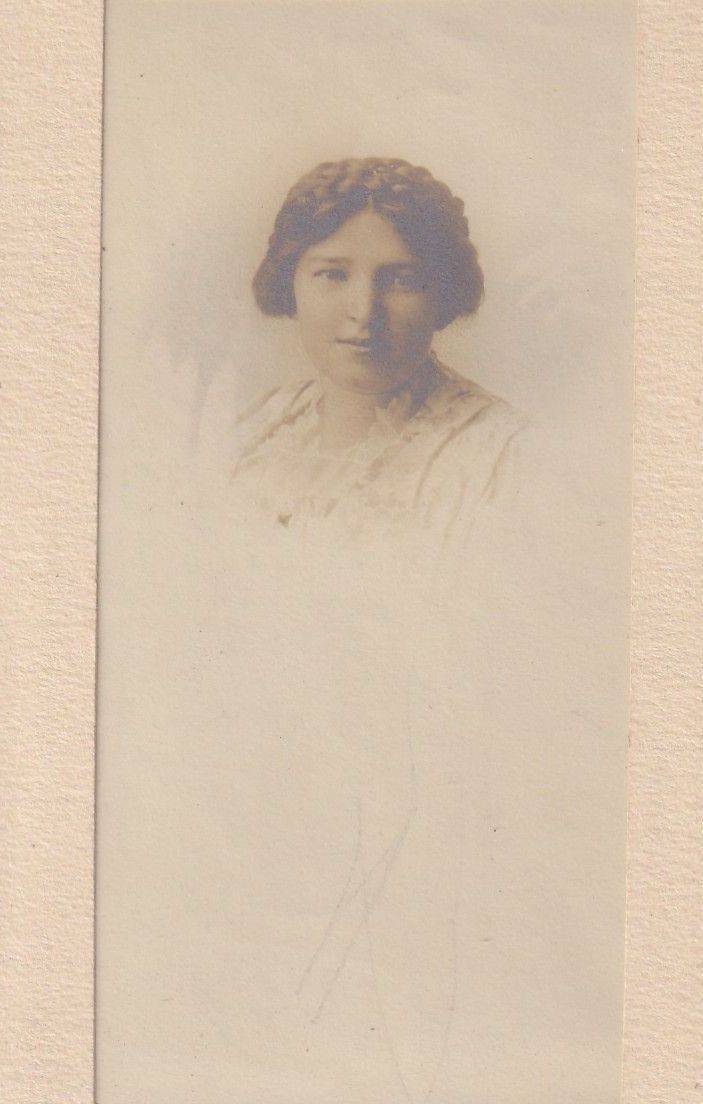 Vignette Portrait of Young Woman with Braided Crown Hairstyle