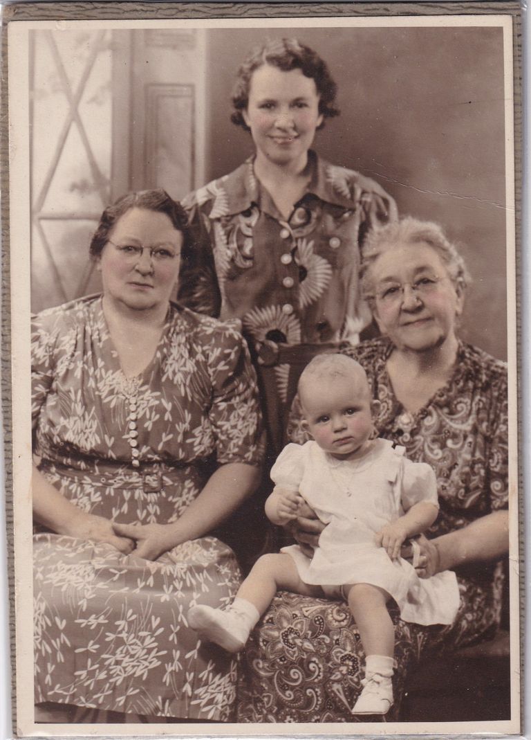 Four-Generation Family Portrait with Infant