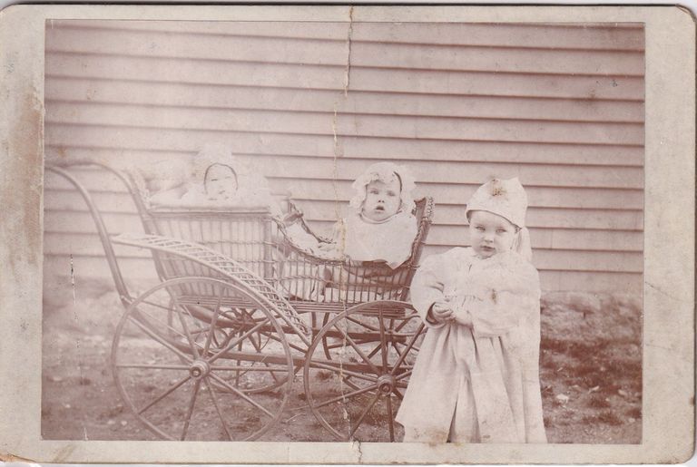Children with Wicker Baby Carriage — Outdoor Domestic Portrait