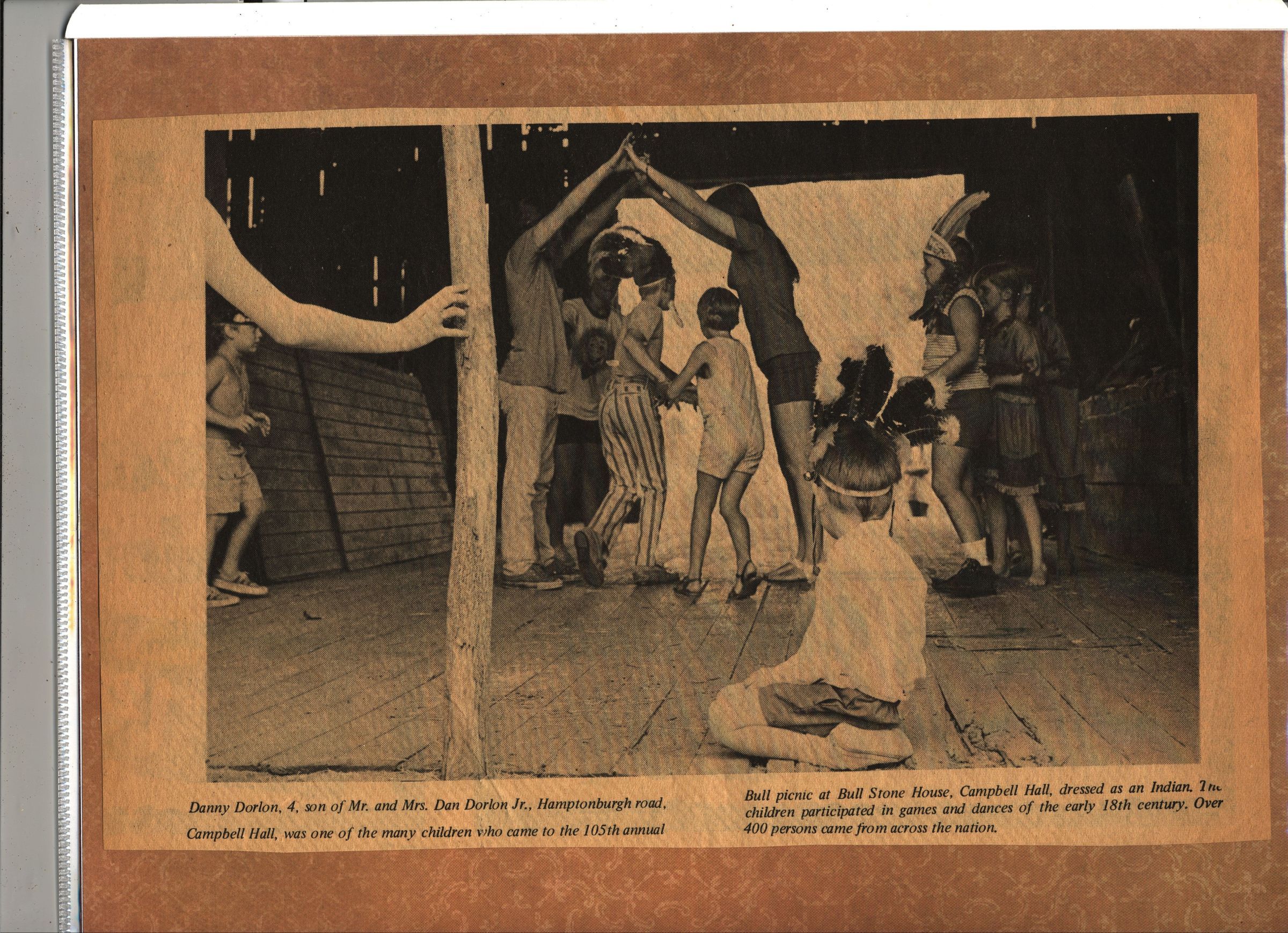105th Bull Picnic - games in the Barn: Danny Dorlon, 4, son of M/M Dan Dorlon Jr, Hamptonburgh Rd, Campbell Hall was one of the many children who came to the 105th annual Bull picnic at Bull Stone House, Campbell Hall, dressed as an Indian. Many children participate in games and dances of the early 18th century. Over 400 persons came from across the nation.