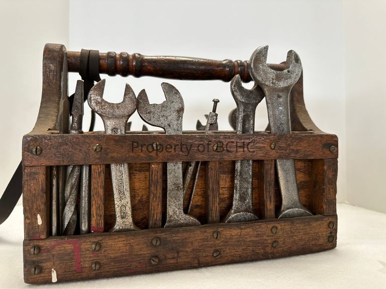 Handmade wooden millworker toolbox belonging to George Beaupré, who immigrated to Biddeford about 1903 with his family. Multiple tools included.