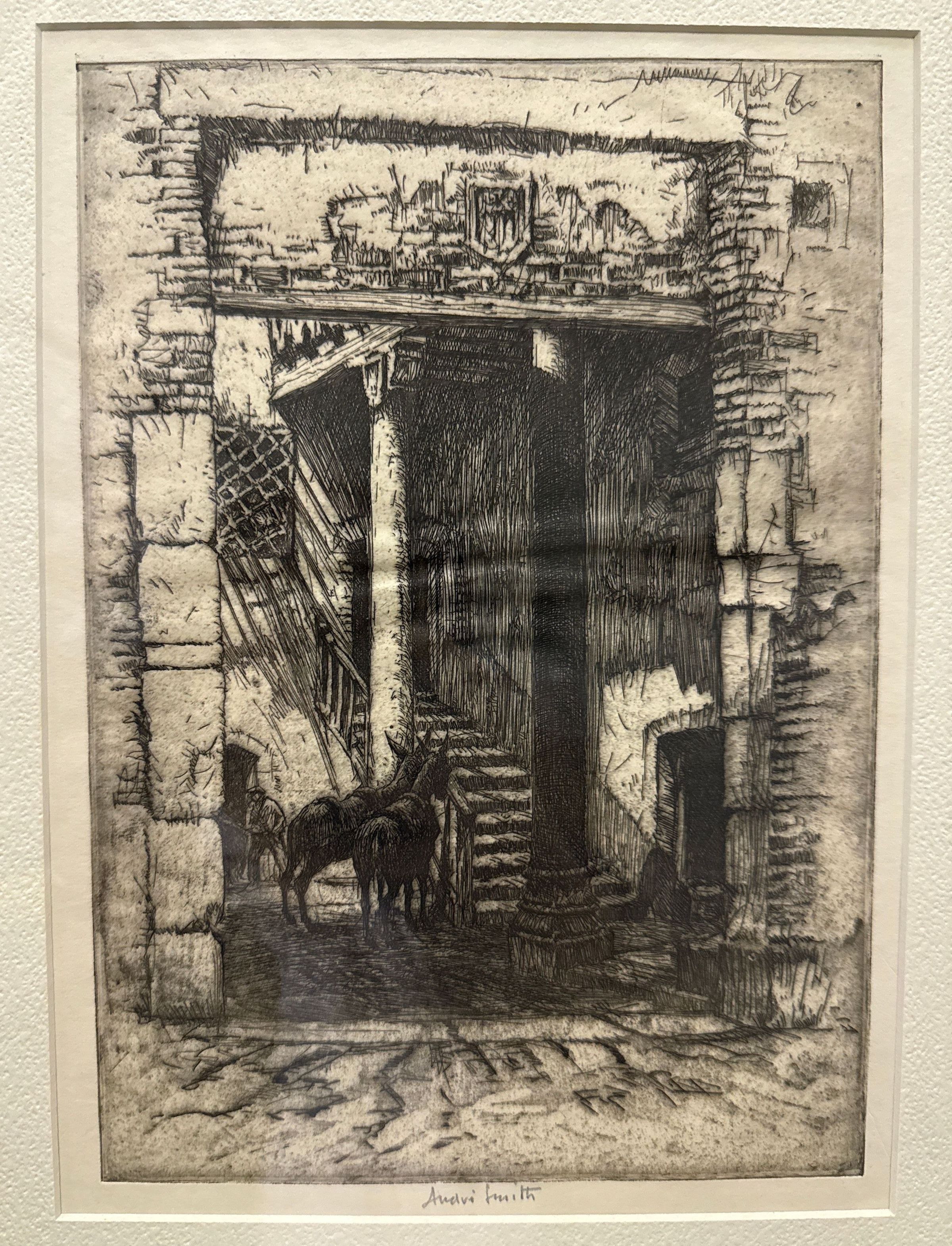 The etching by J. Andre Smith depicts a quaint courtyard in Segovia, Spain, showcasing a rustic, stone archway that leads into an intimate space characterized by aged, textured walls. Within the courtyard, there stands a pair of donkeys near a staircase, which ascends into the shadowy interior of the structure. The detailed lines capture the intricate architecture, while the shadows evoke a sense of historical depth, enhancing the overall nostalgic ambiance.