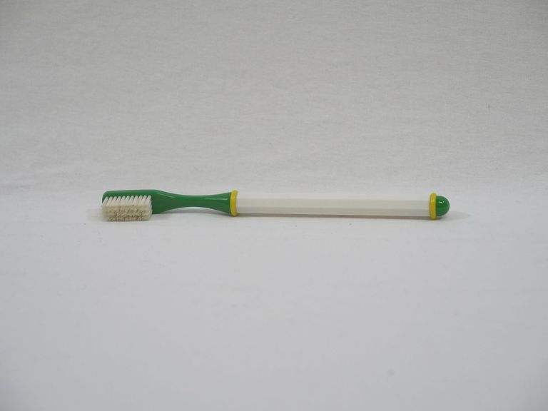 Green and White Toothbrush