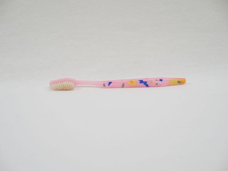 Pink Colgate Toothbrush