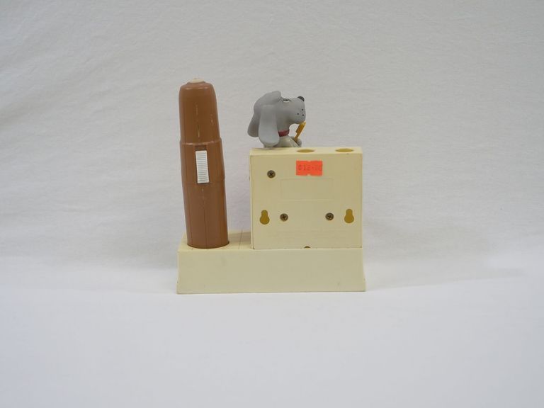 2004.68.1a,.1b Pound Puppies Battery Toothbrush Holder and Pound Puppies Batter Toothbrush Stand Untagged Back.jpg