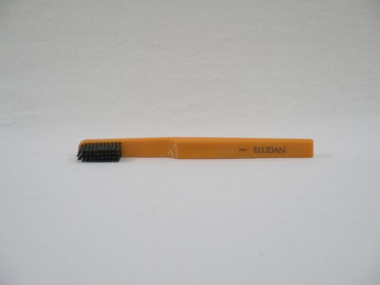 Orange Eludan Toothbrush