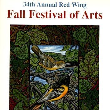 Poster for 34th Annual Red Wing Fall Festival of Arts: A full color poster promoting the Red Wing Arts Association's 34th annual Fall Festival. The poster features art of two birds -- one brown with an orange belly, the other black with an orange belly and back -- on a branch framed by leaves and other botanicals in shades of green and red. The poster art is by Julia Crozier. The text reads: "A Celebration of Art, Music, and Food In Historic Downtown Red Wing. October 14 & 15, 2000. Saturday 9am-5pm, Sunday 10am-4pm." RWAA's logo is in the lower left corner in blue. Munson Printing Co's logo is in the lower right.