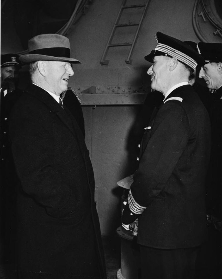          SECNAV Frank Knox with Capt Marcel Decamond, CO of the French battleship RICHELIEU refitting in New York. NH 70494 picture number 1
   