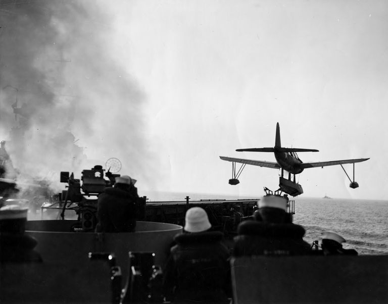          A Kingfisher float plane is airborne after being launched off one of IOWA's catapults. US Navy photograph. picture number 1
   