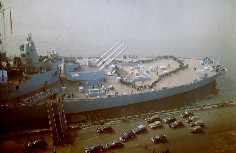          IOWA's sailors lined up on the fantail, waiting to go below after Commissioning ceremonies. 80-G-K-822 picture number 1
   