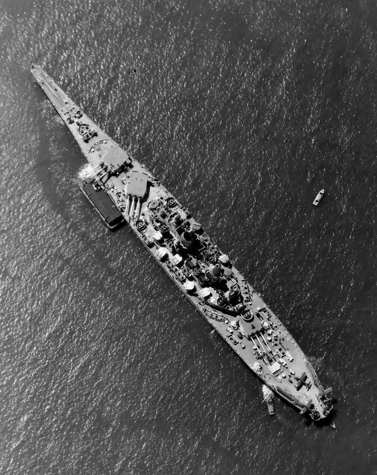          USS Iowa anchored off New York with an ammunition barge tied up on her port. April 7, 1943 - US Navy photo. picture number 1
   