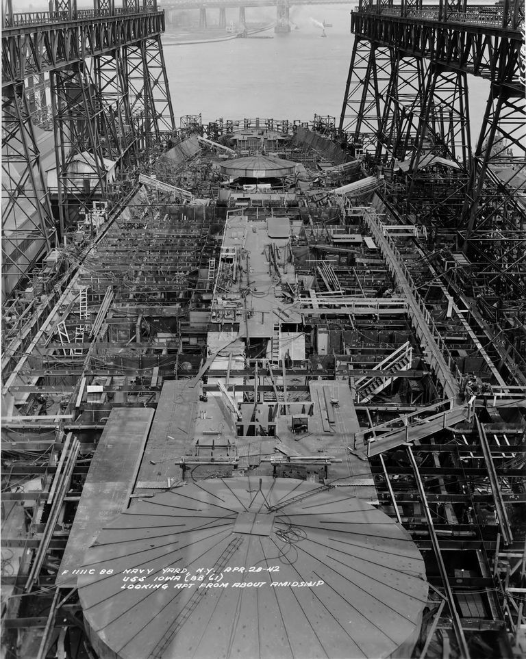          USS Iowa amidship looking aft, Turret 2 in foreground with No. 3 aft, Main Deck plating needs completing - March 28, 1942 - F1111C88 picture number 1
   