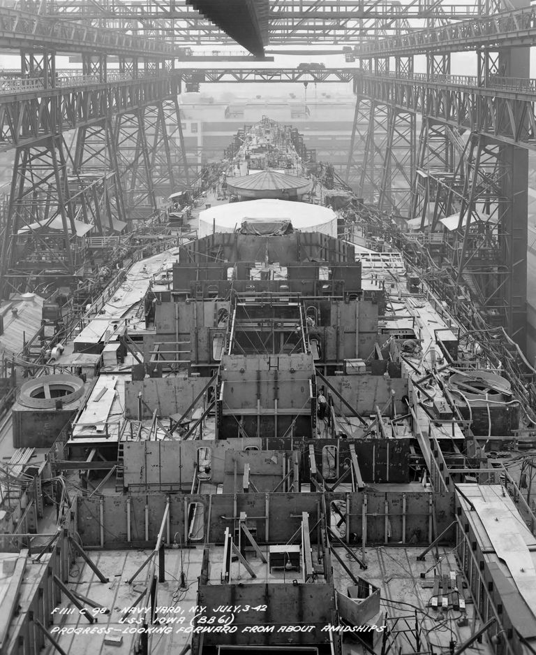          USS Iowa amidship looking forward showing construction of Main Deck and the superstructure's bulkheads - July 3, 1942 - F1111C98 picture number 1
   