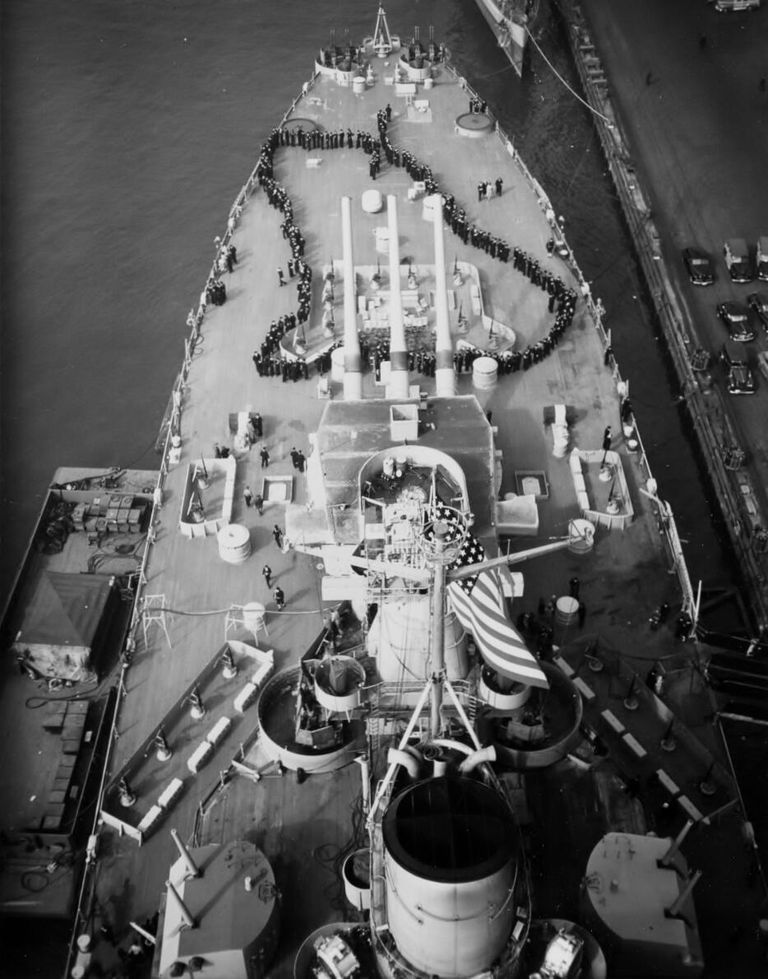          IOWA's sailors lined up on the fantail, waiting to go below after Commissioning ceremonies. 80-G-K-1066. picture number 1
   