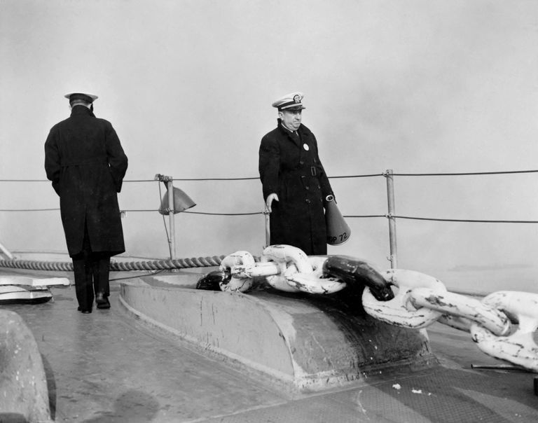          IOWA drops anchor to wait for a low tide so she may be towed under the Brooklyn Bridge. October 20, 1942 - 80-G-13568 picture number 1
   