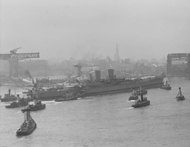          Tugs are seen arriving to move USS Iowa to her fitting out berth following her launching at the Brooklyn Navy Yard. 80-G-K-875. picture number 1
   
