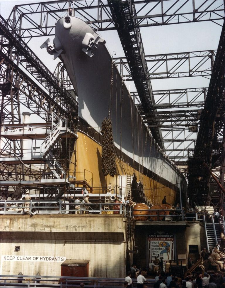          USS Iowa on the slipway ready to be launched. Note drag chains hanging from the bow. Rare color photo 80-G-K-13507 picture number 1
   