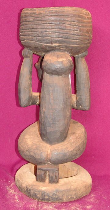 Female figure holding a container - Image 2