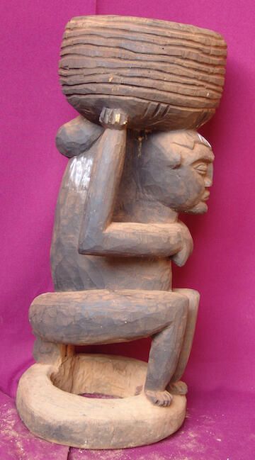 Female figure holding a container - Image 3