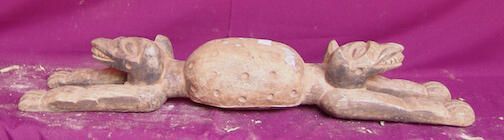 Footrest in the shape of two leopards