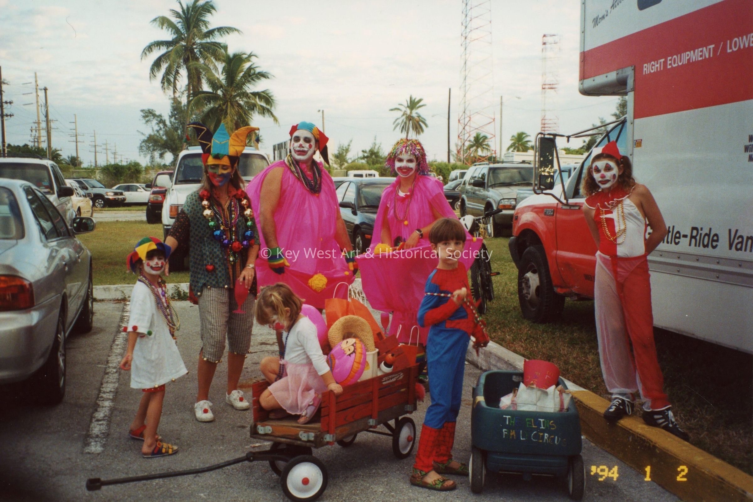 A group of unknown people dressed up.