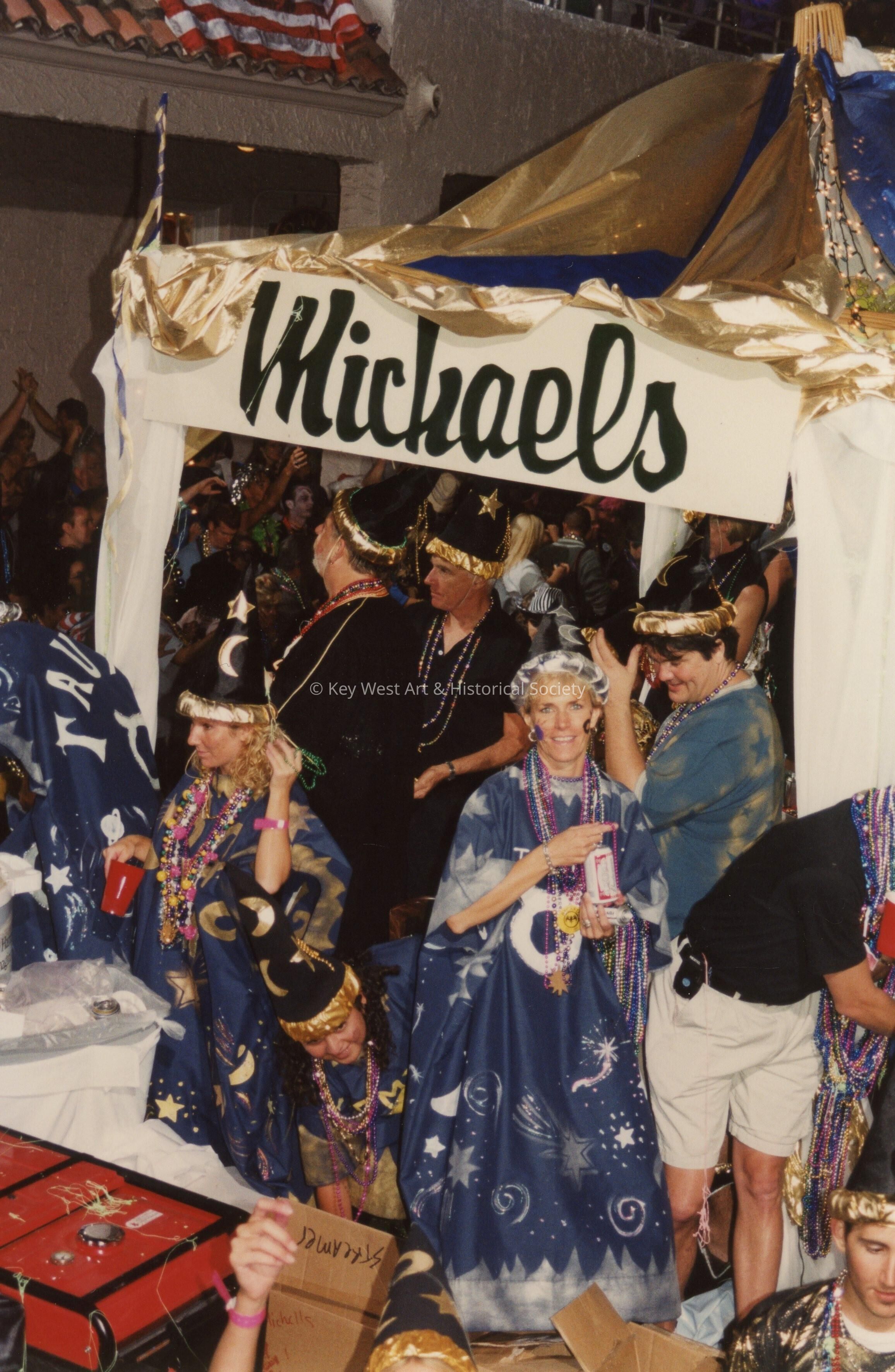 A float in the parade that reads Michaels.