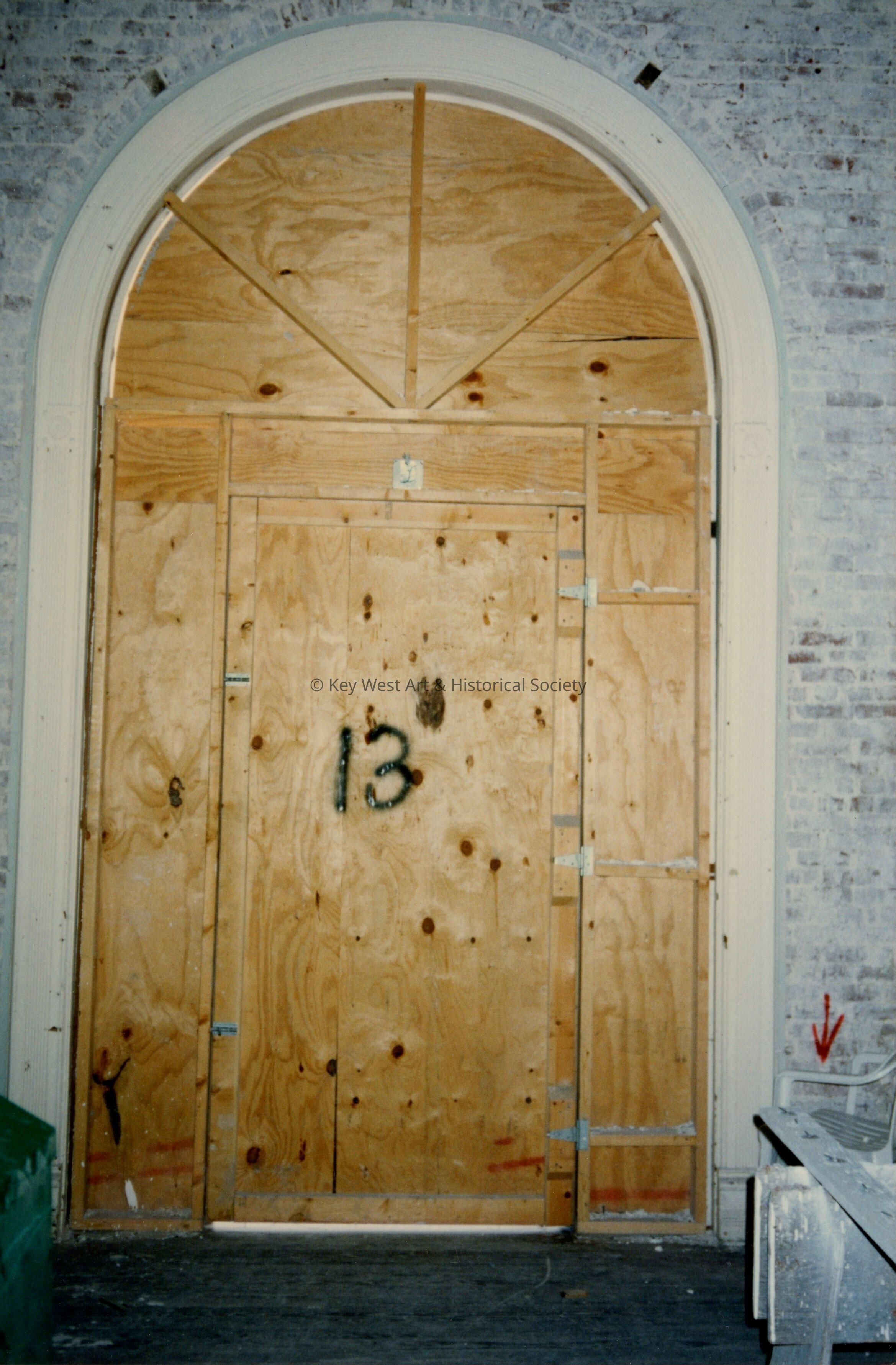 A door labeled number 13.