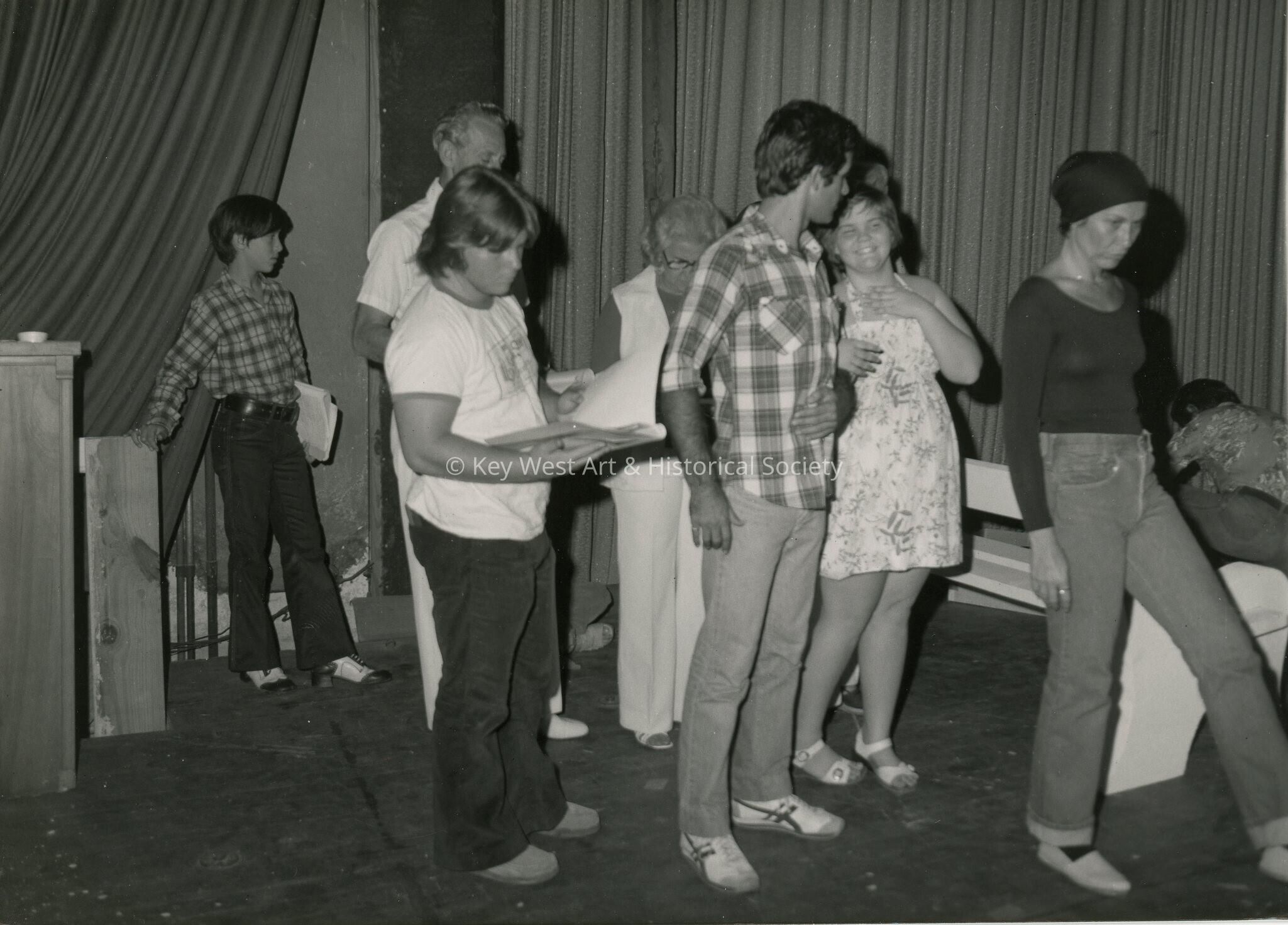 A group of people standing around