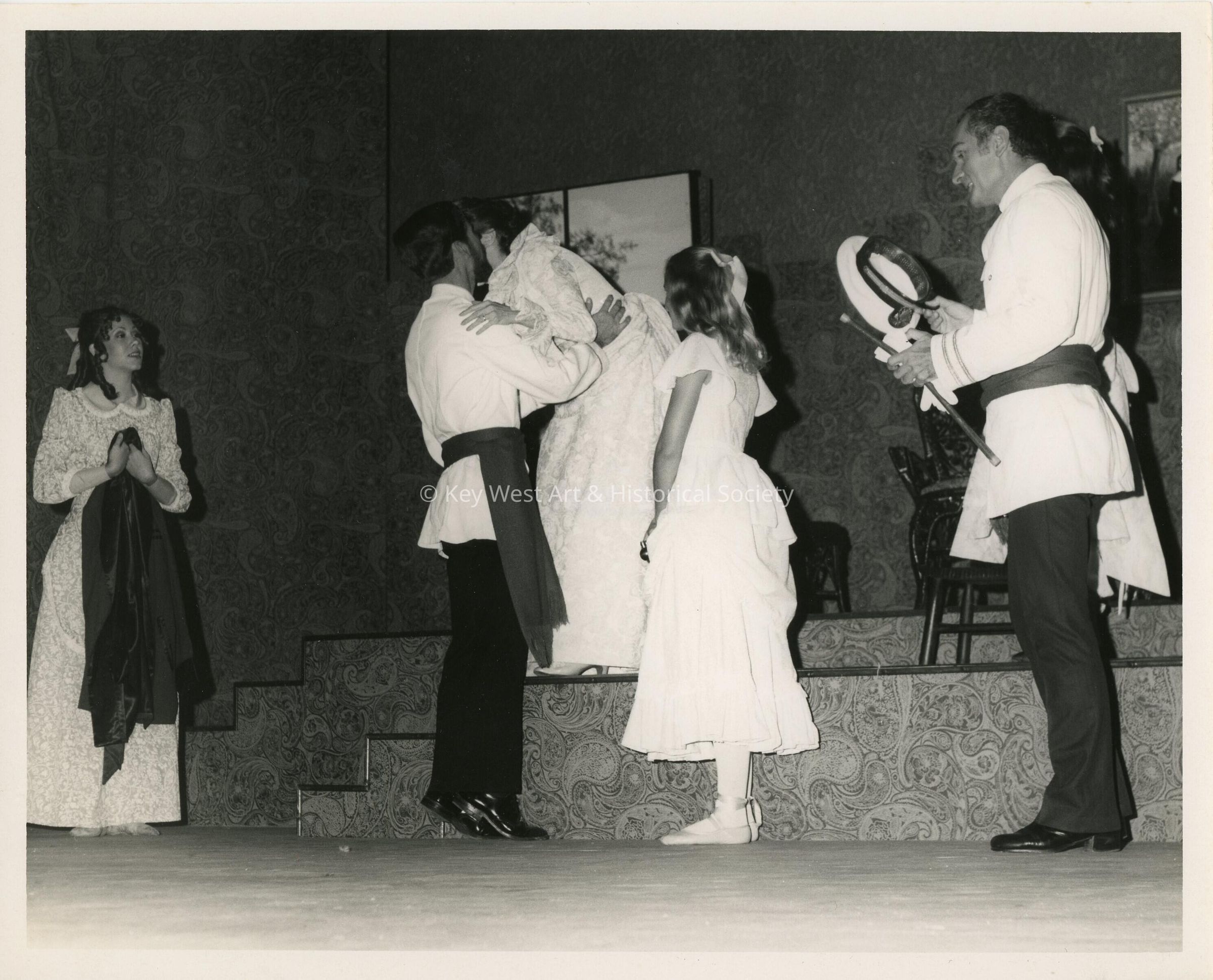 An unknonw group of people in a play