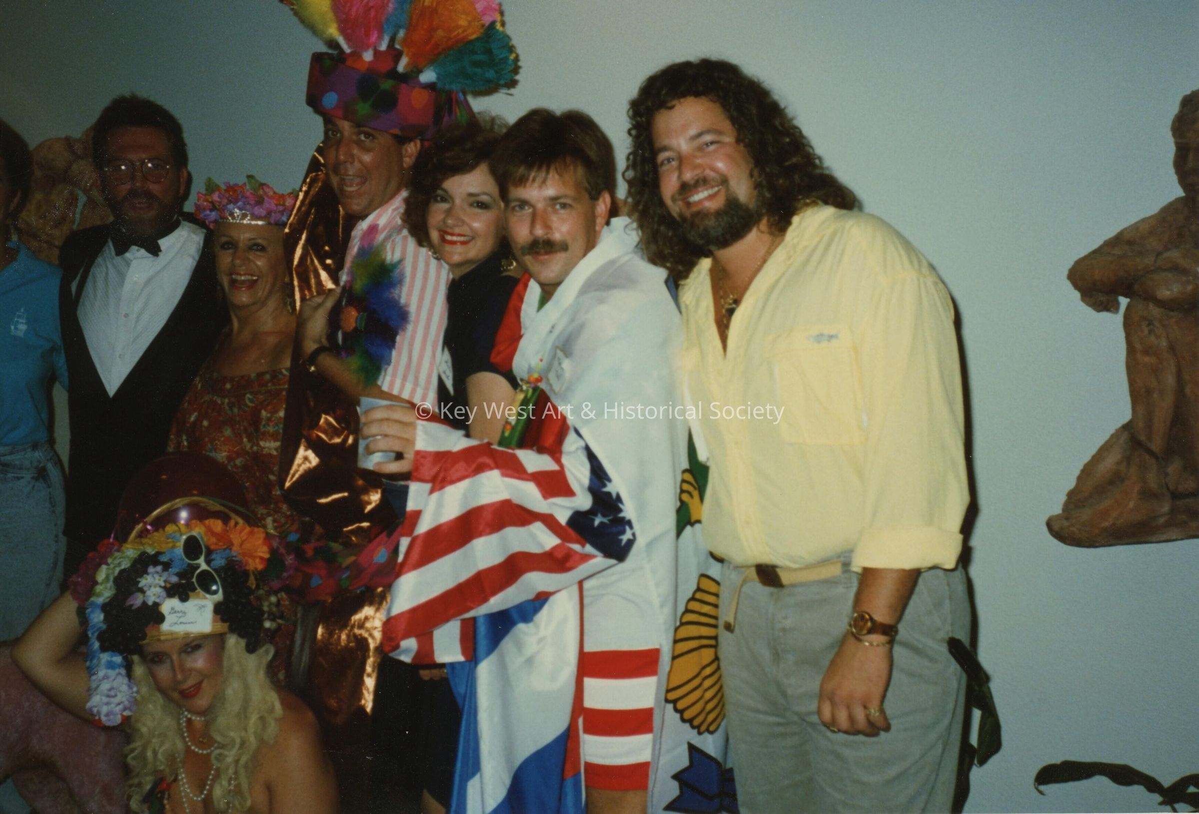 A group of unknown people dressed up.