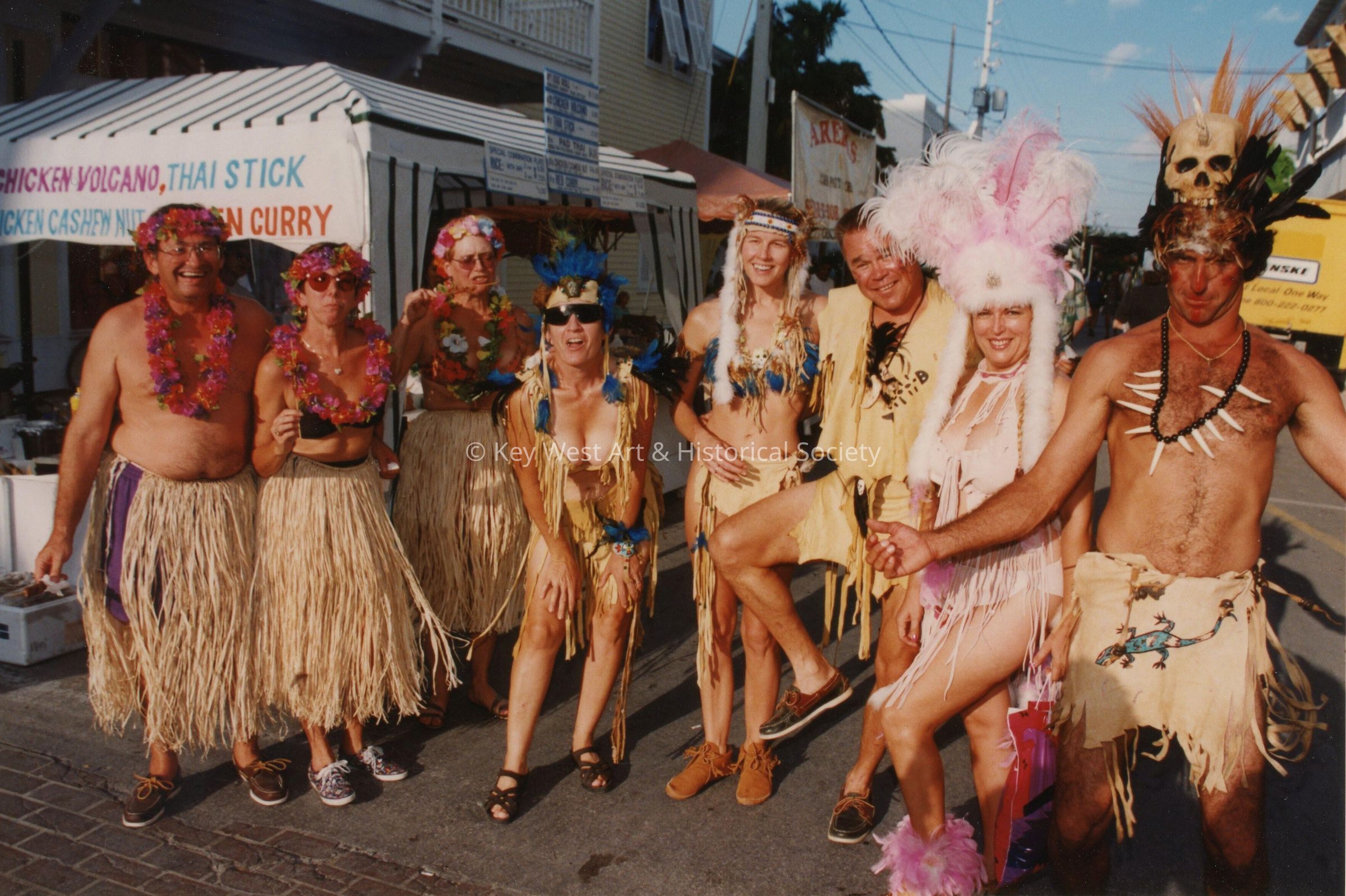 A group of unknown people dressed up.