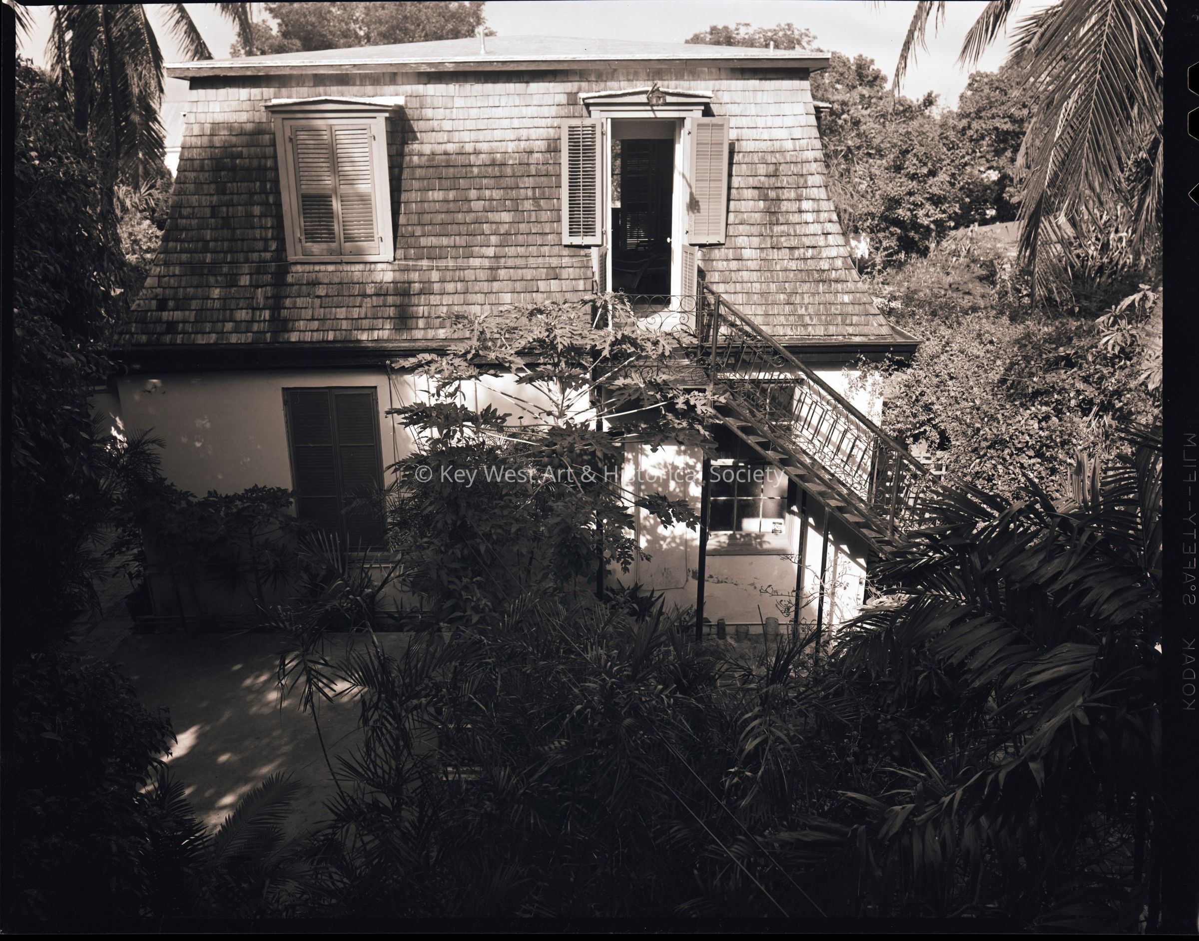 Exterior stairs at the Hemingway House; © Key West Art & Historical Society