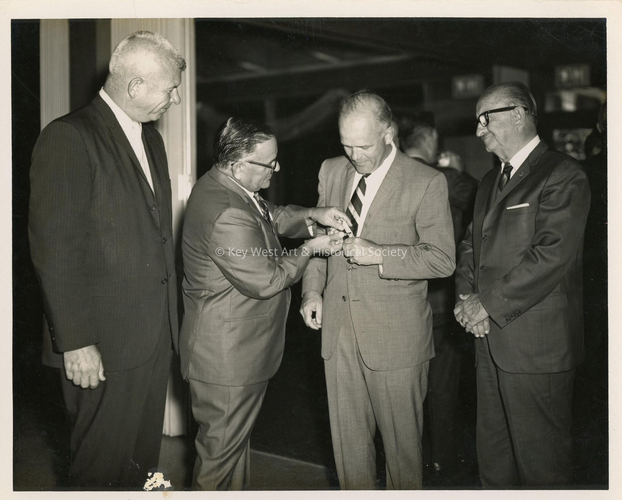 4 Unknown men in suits