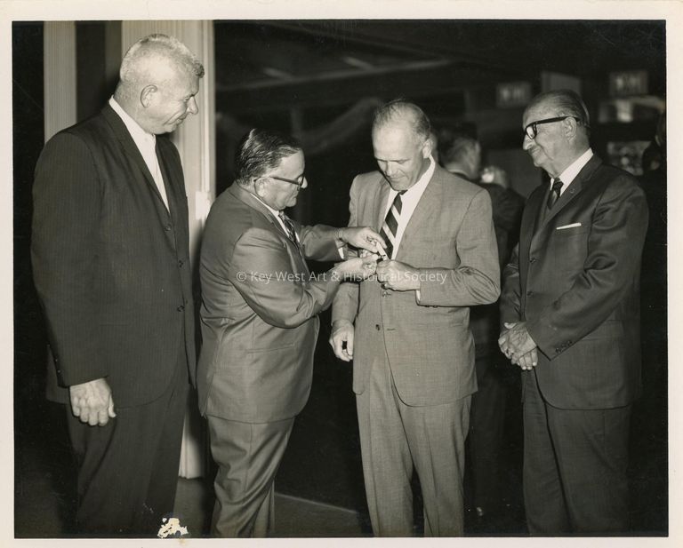 4 Unknown men in suits