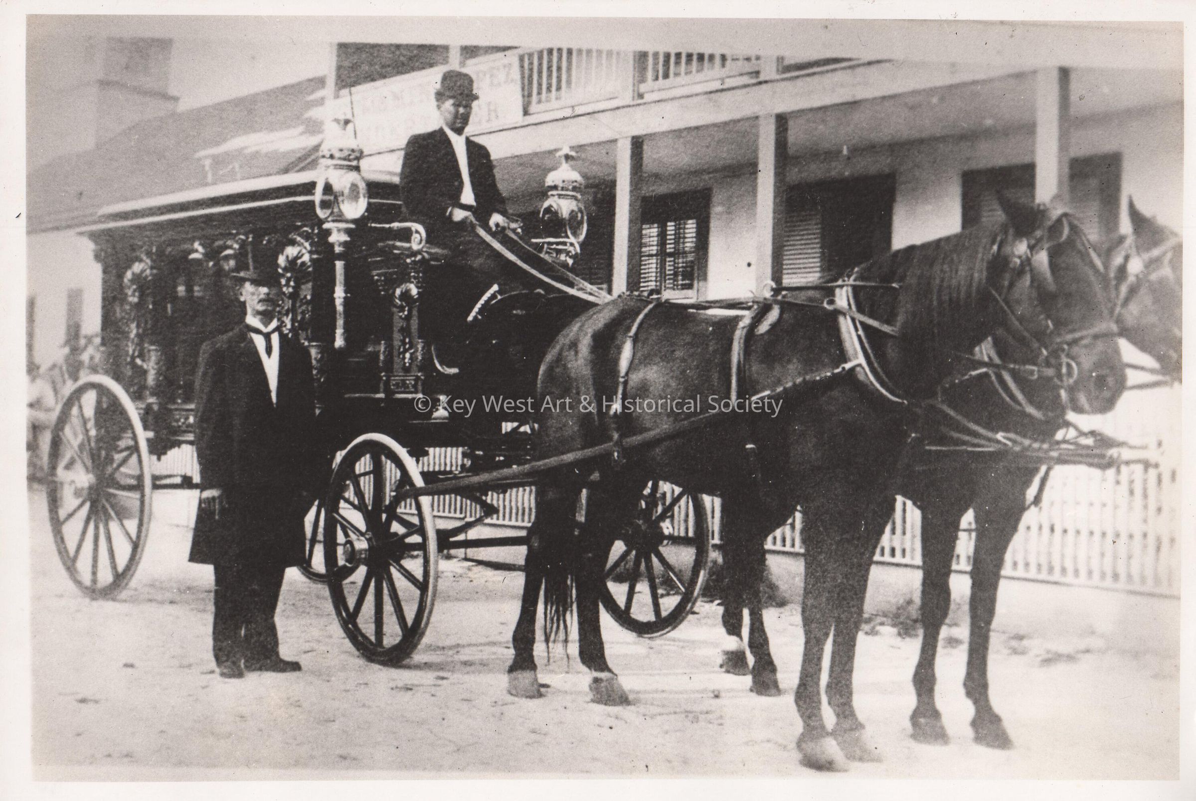 Horse-drawn hearse and two men picture number 1