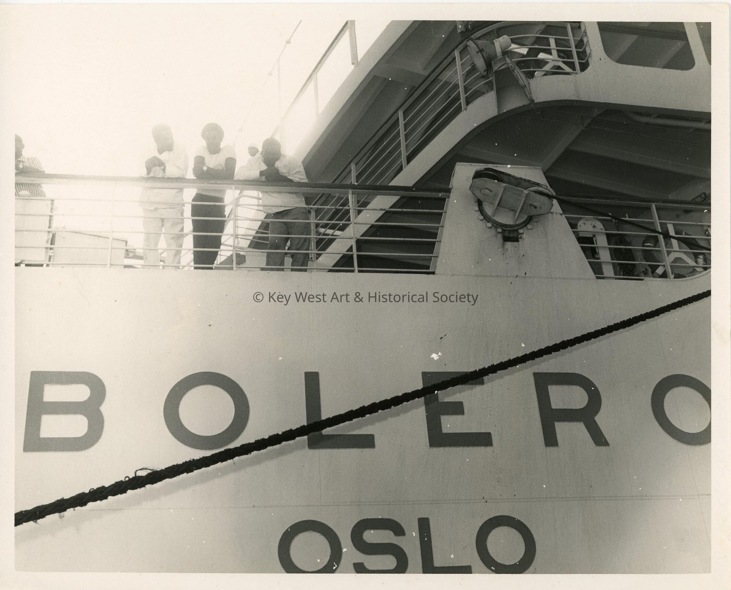 A few unknown people on a ship