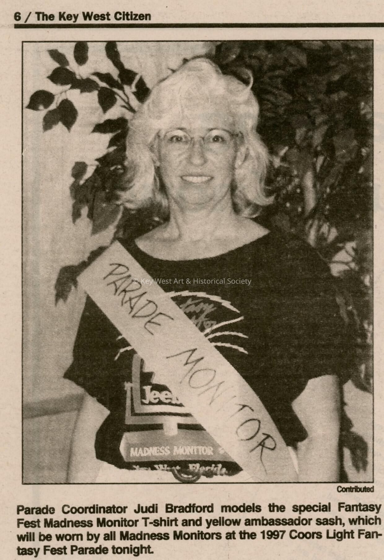 A picture and caption of parade monitor Judi Bradford in the Key West Citiz