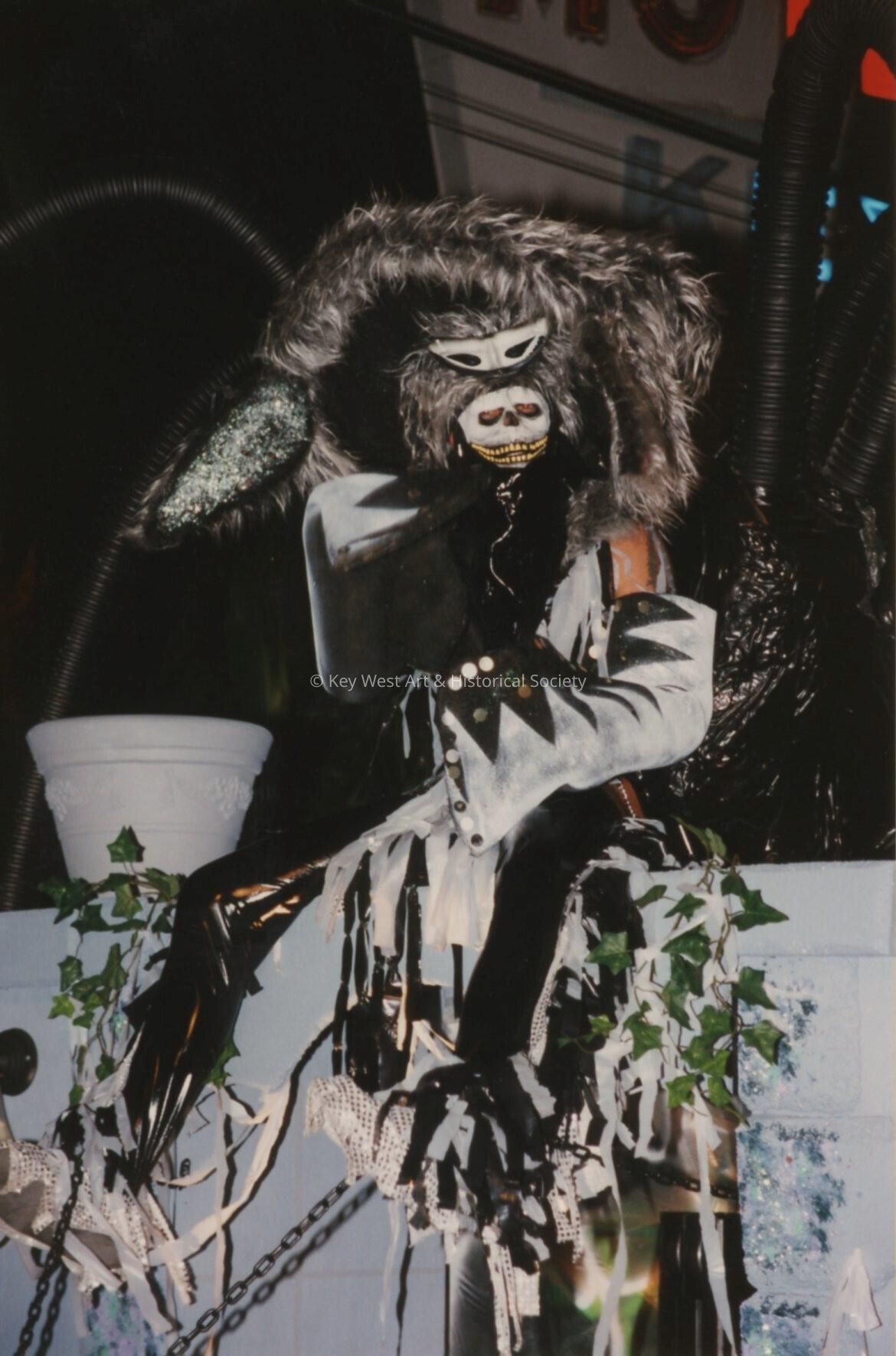 An unknown person dressed up on a float.