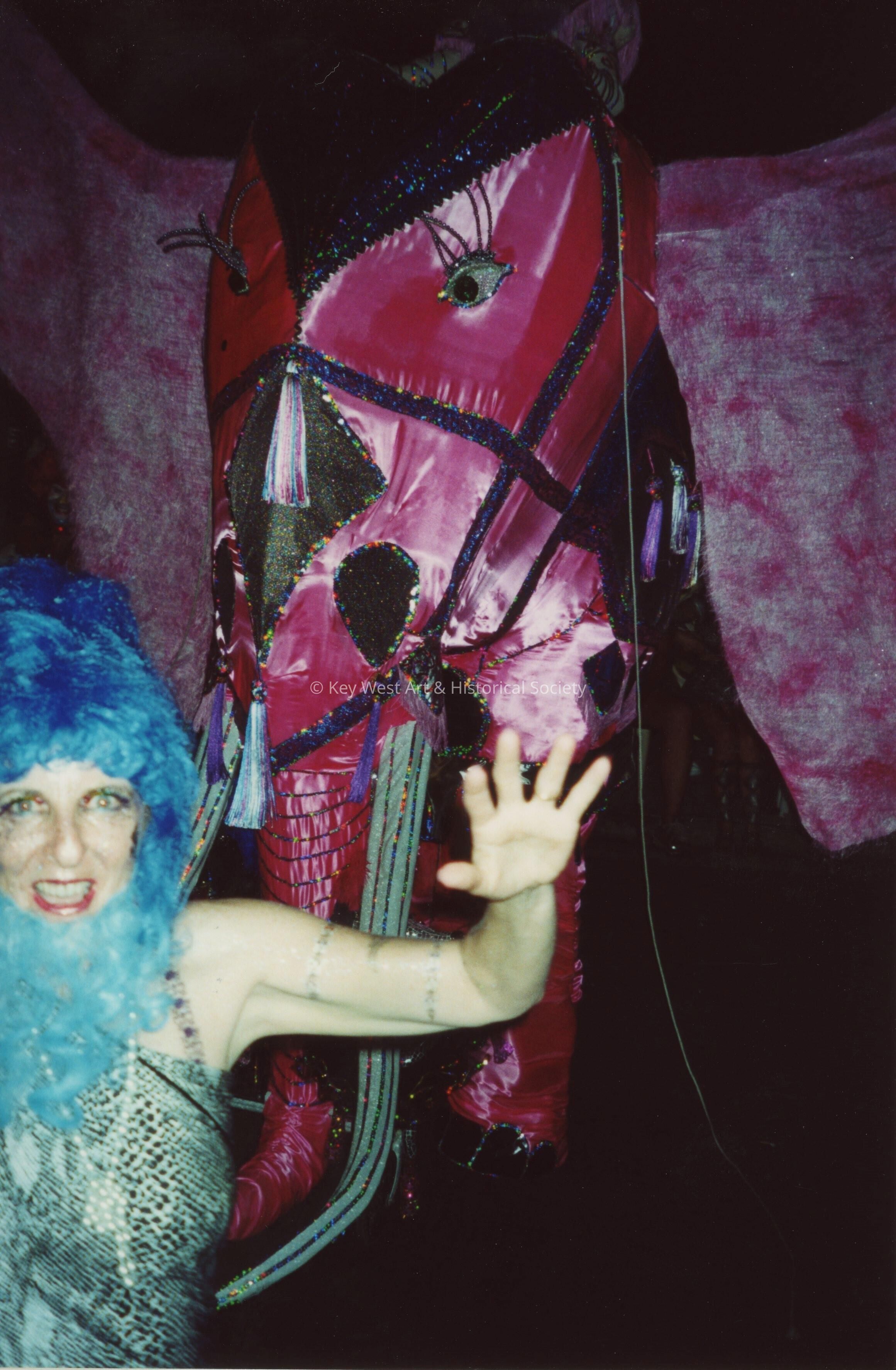 An unknown woman dressed up.