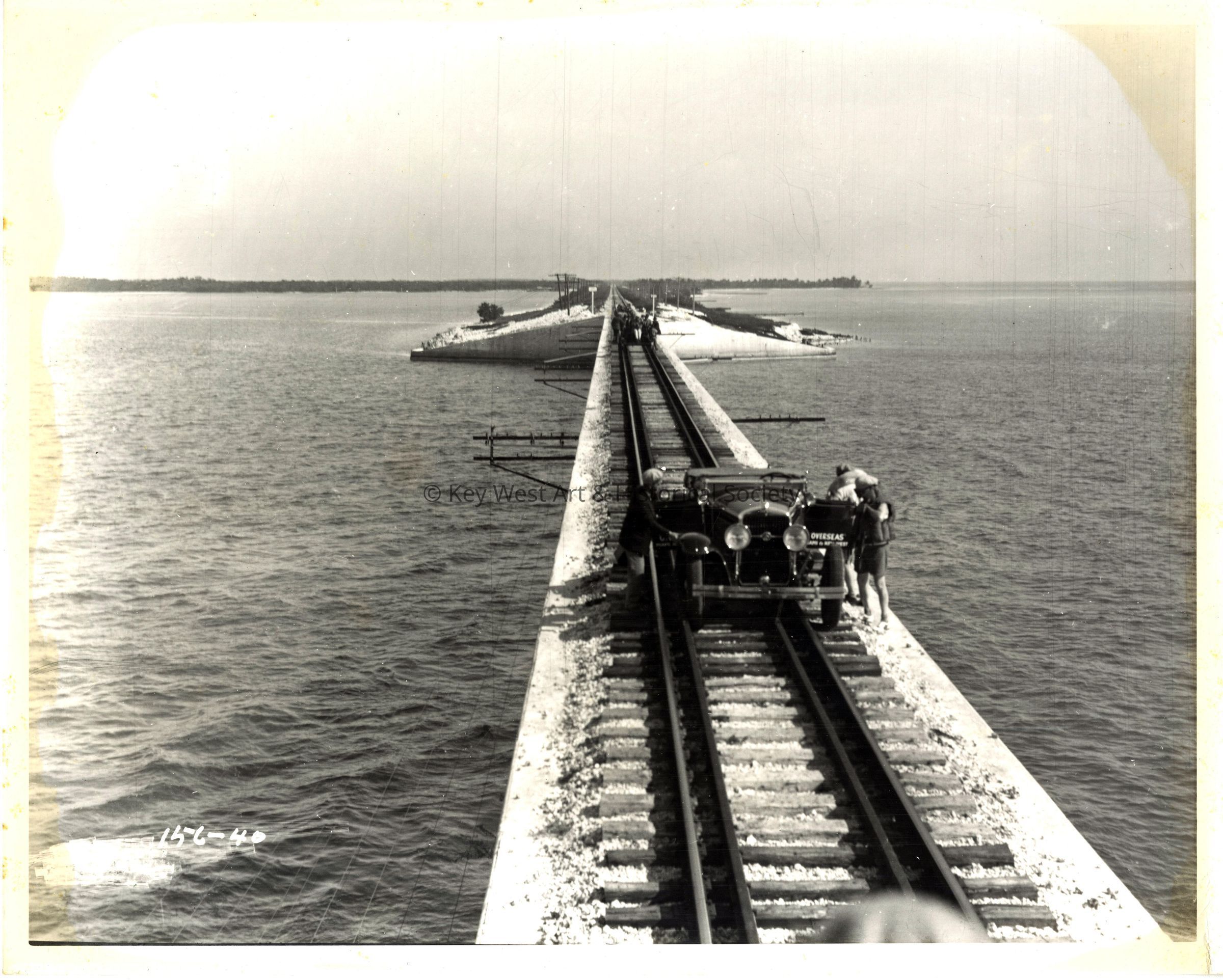 Automobile on Long Key Bridge Railroad Tracks; © Key West Art & Historical Society