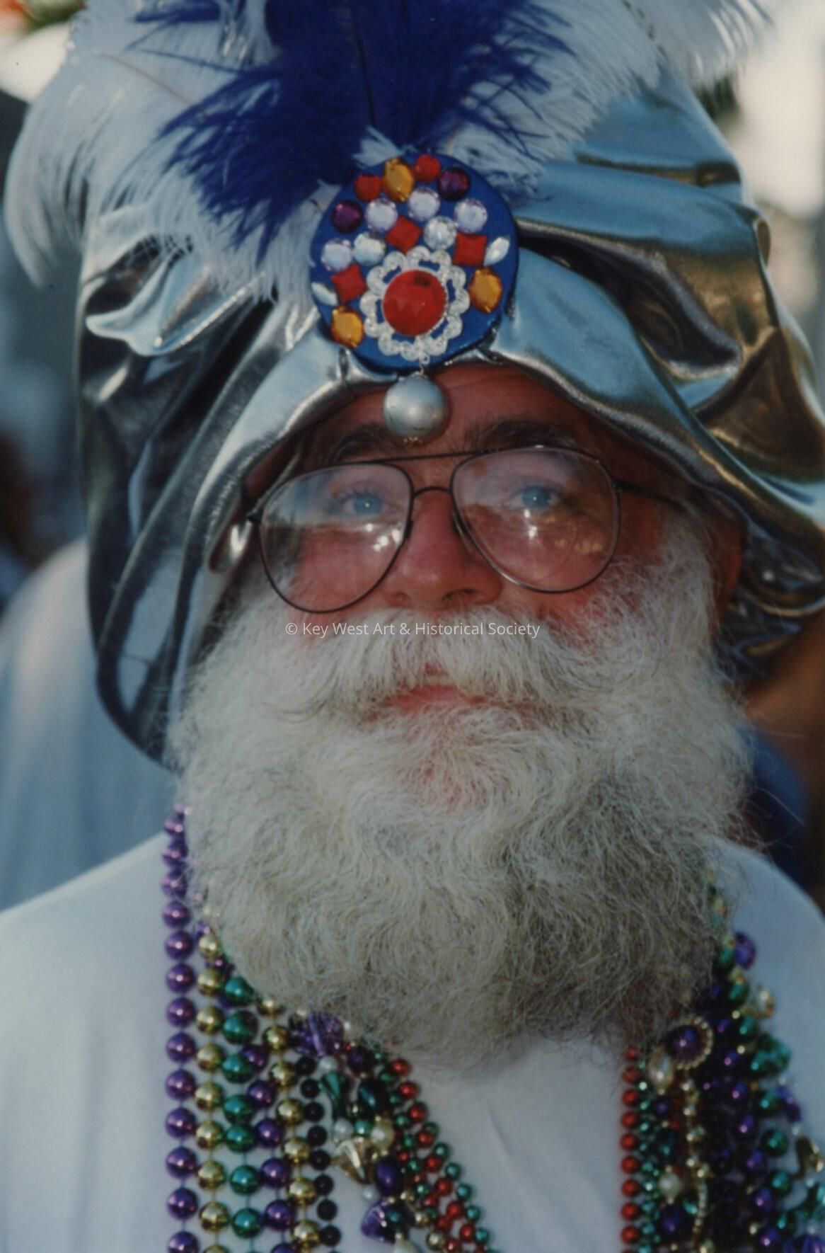 An unknown man dressed up.