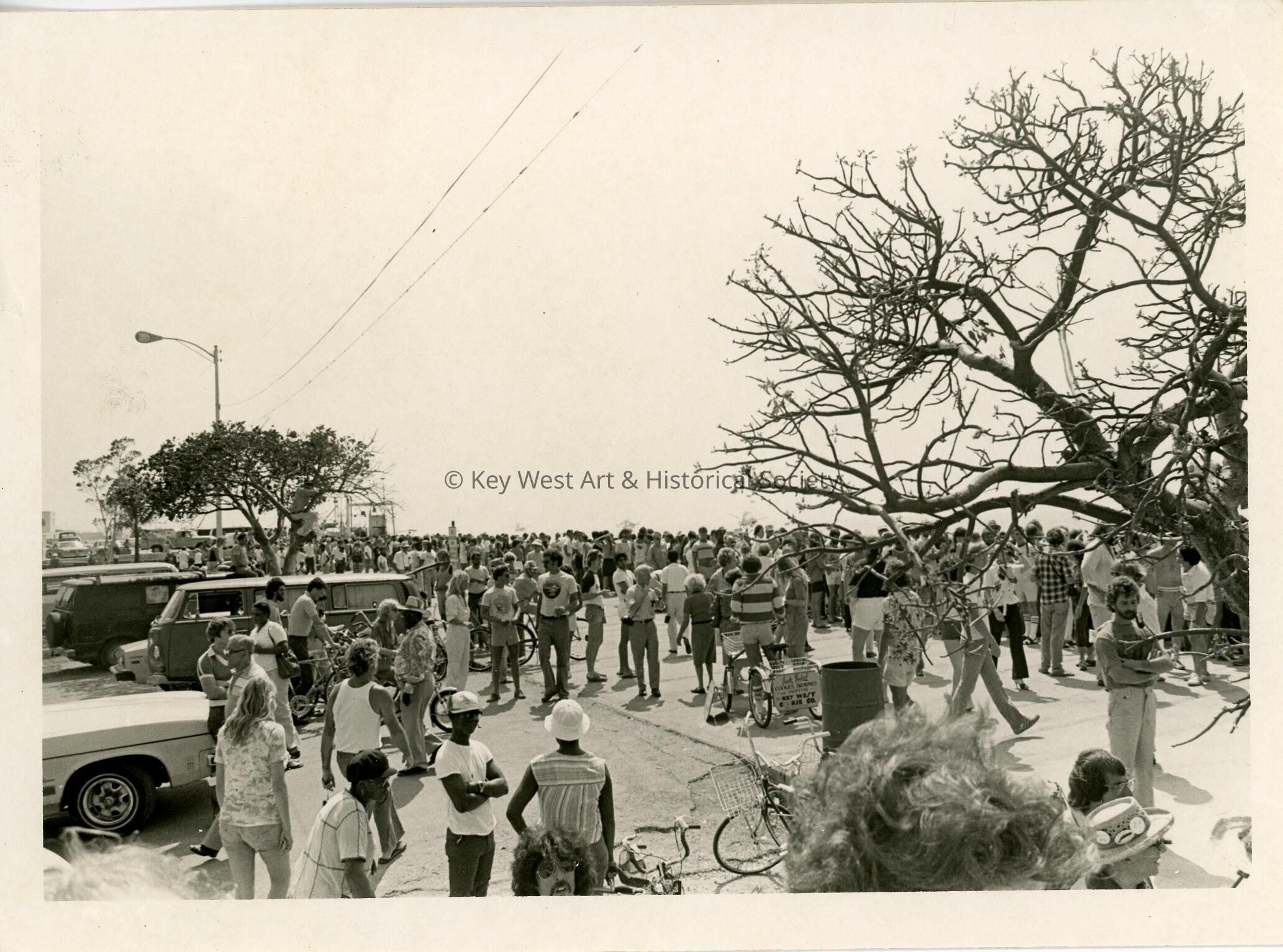 A group of people standing around