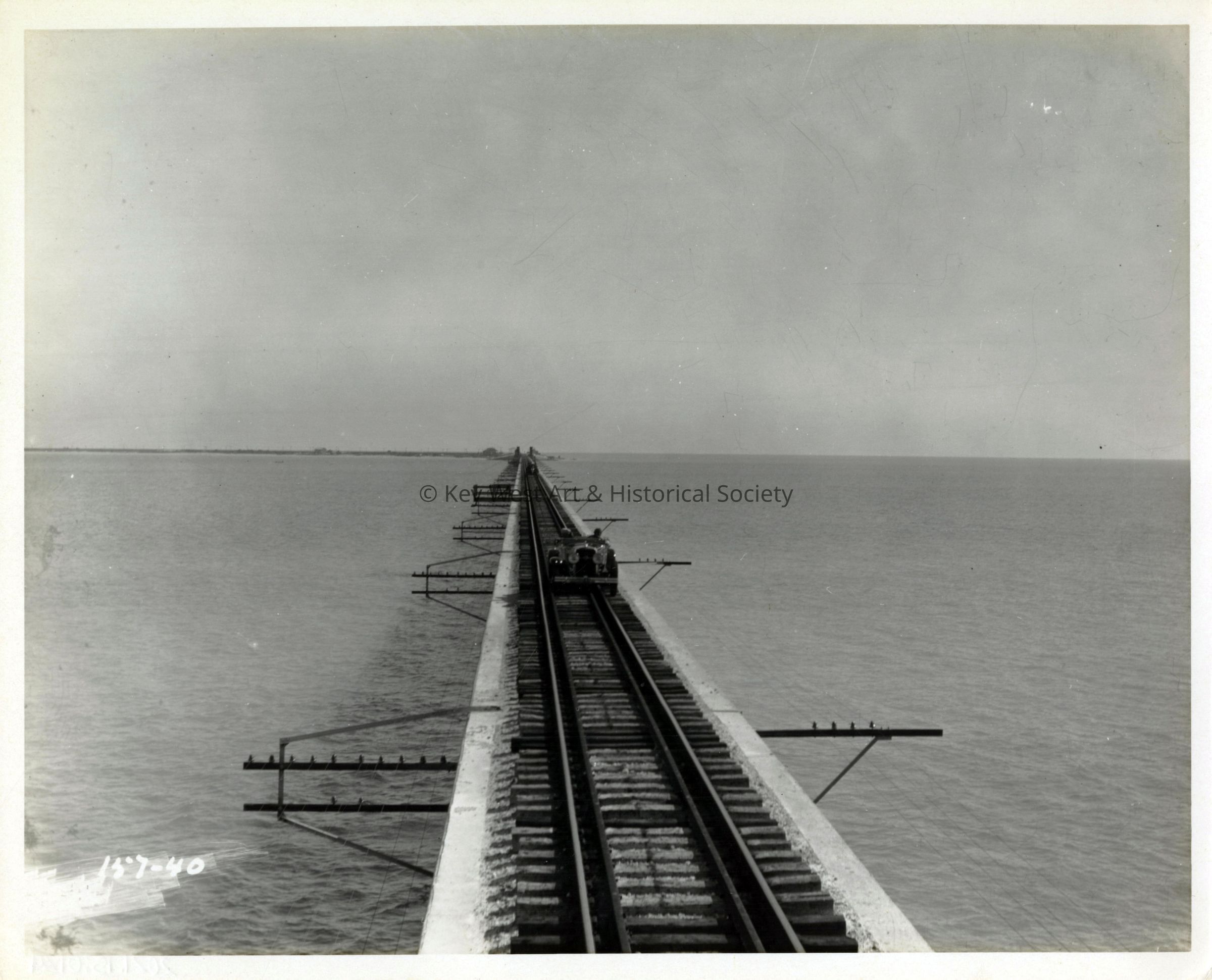 Automobile on Long Key Bridge Railroad Tracks; © Key West Art & Historical Society