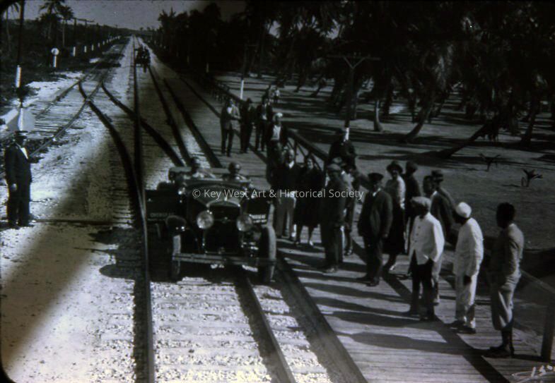 Automobile on Train Track at Long Key; © Key West Art & Historical Society