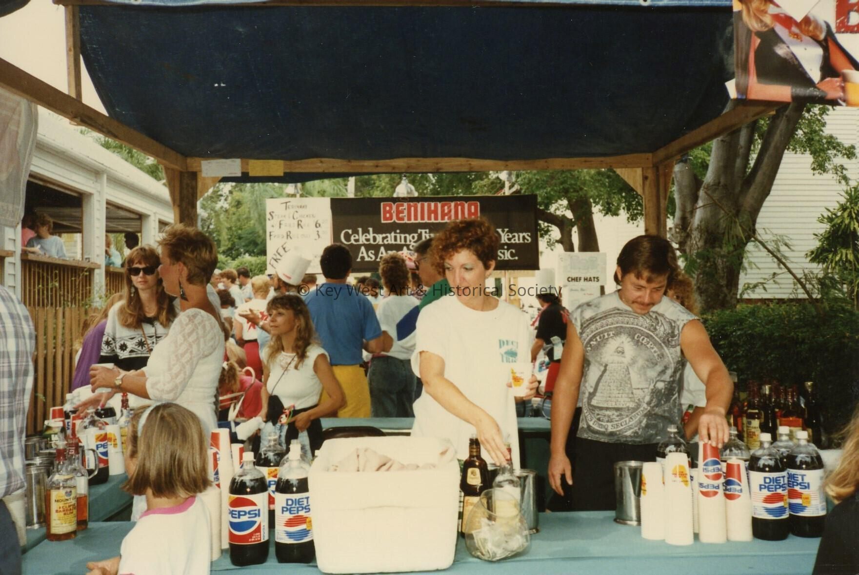 A booth selling alcohol and soda.