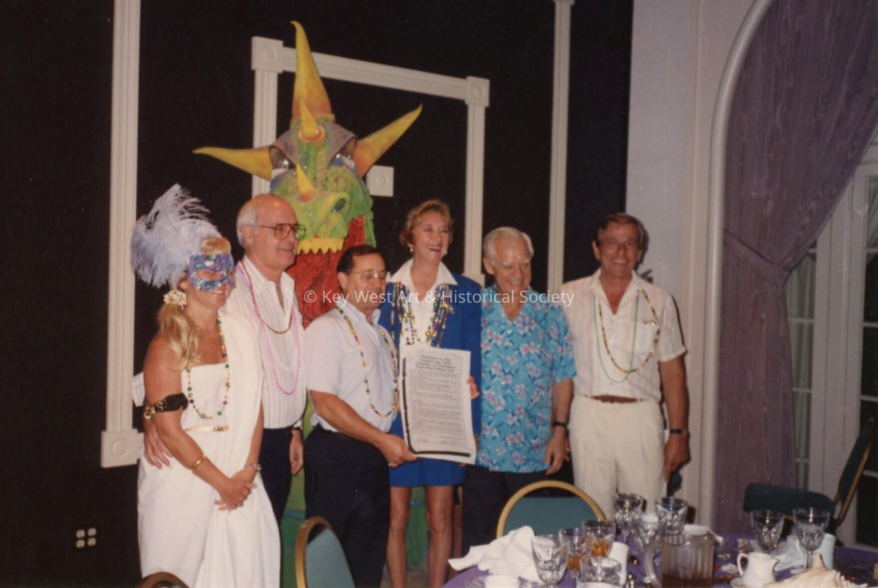A group of unknown people at the awards ceremony.