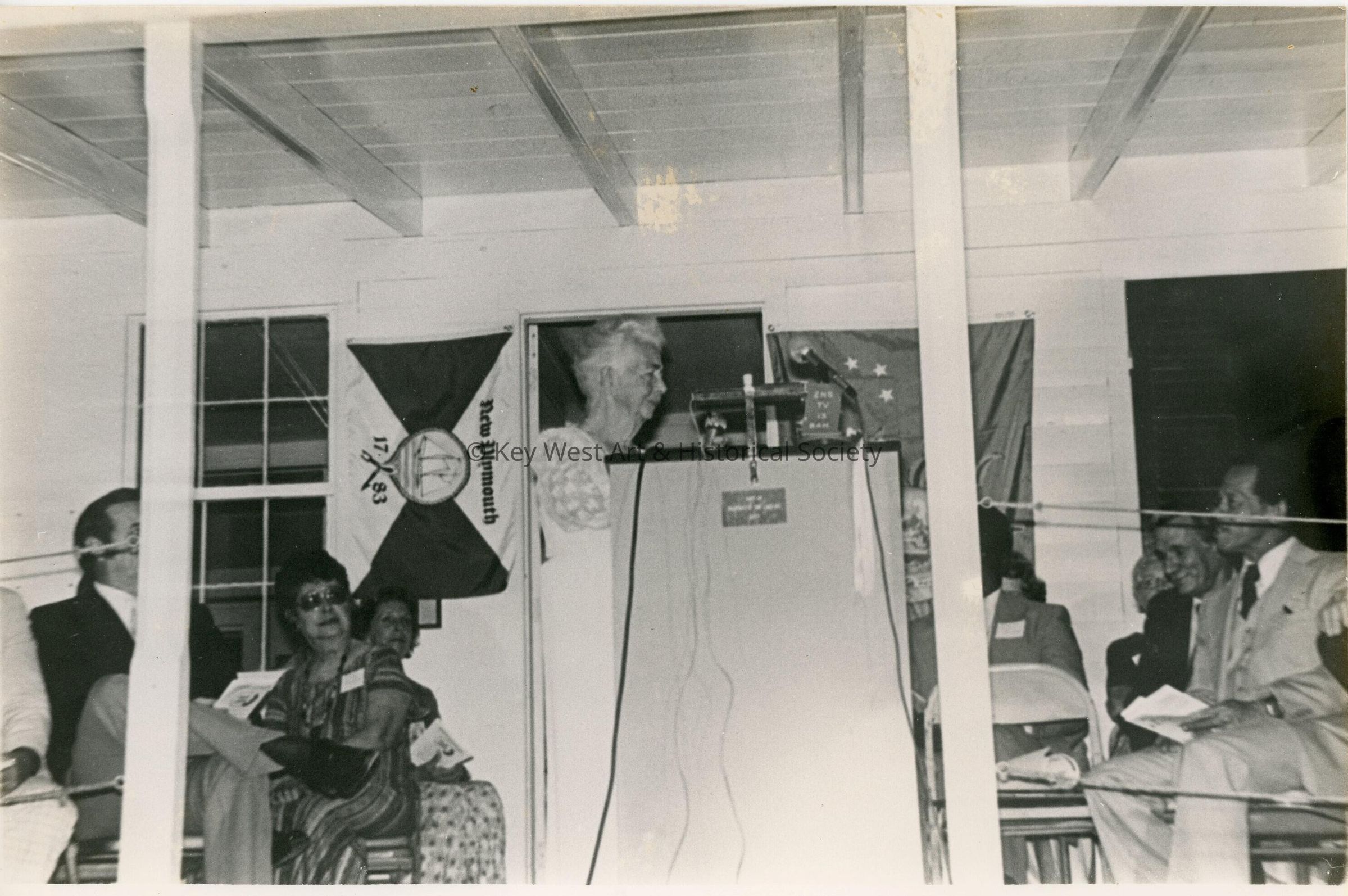 An unknown group of people at a meeting